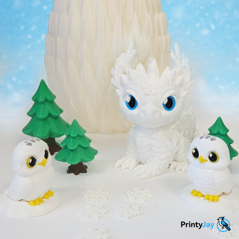 White snow baby dragon 3D print with trees and snowy owls - PrintyJay
